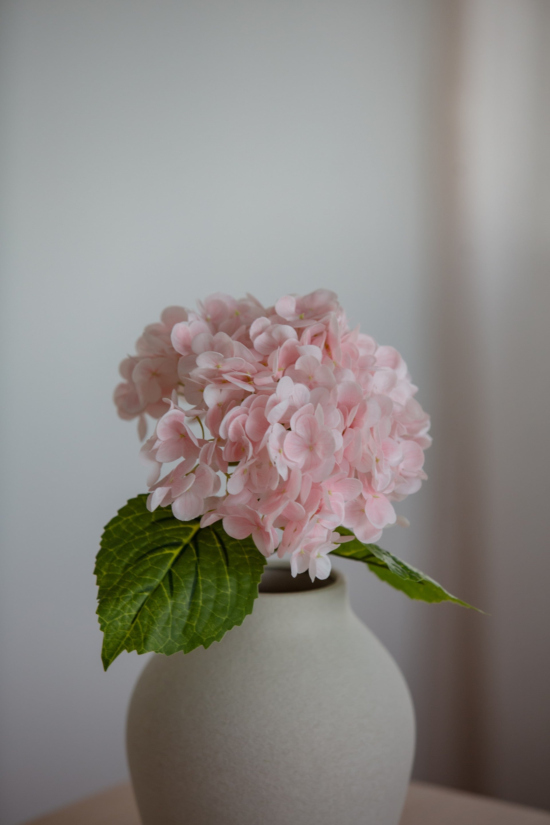Kunstig hydrangea i lys rosa farge