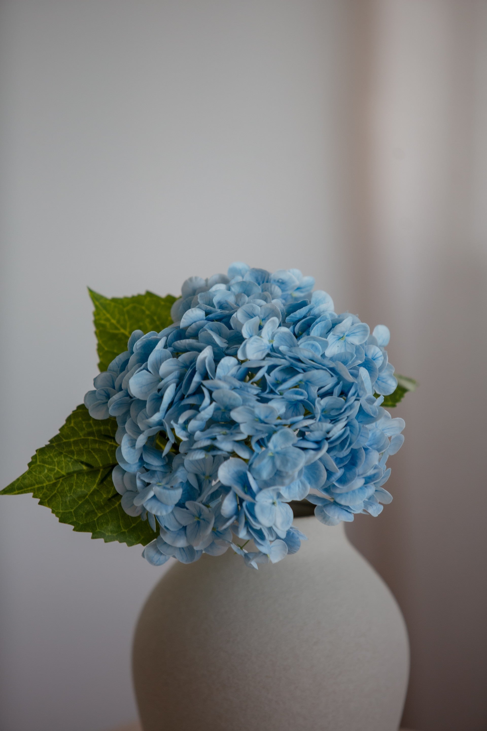 Kunstig hydrangea i blå farge